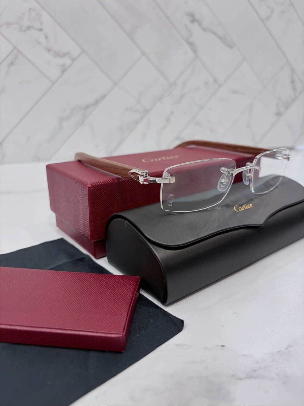 Cartier SUNGLASSES WITH ELONGATED C DE CARTIER MOTIF